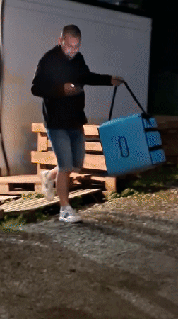 Evening street activity and delivery scenes in Tallinn