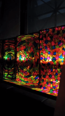 Colorful mosaic lamp creates vibrant light patterns in Bangkok