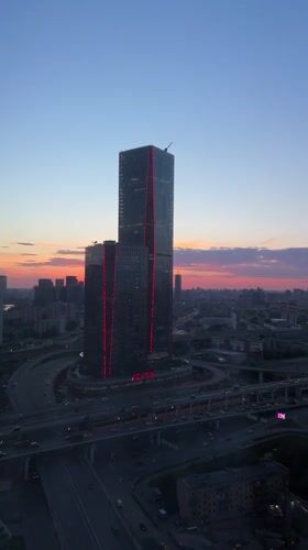 Evening skyline documentation captures Khimki's modern towers at dusk