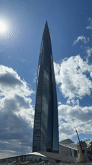 Woman takes selfies at Lakhta Center tower in Saint Petersburg