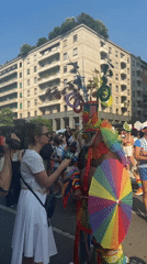 Milan Pride parade rolls through the city on a sunny afternoon