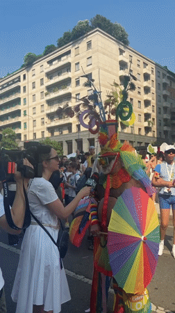 Milan Pride parade rolls through the city on a sunny afternoon