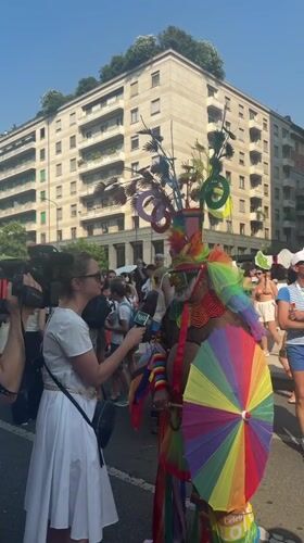 Milan Pride parade rolls through the city on a sunny afternoon
