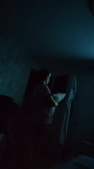 Quiet evening moments captured in dimly lit Noviy home