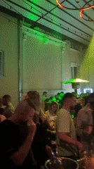 Evening documentation shows Plovdiv street life to indoor party