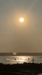 Morning beach activities documented in General Luna, Philippines