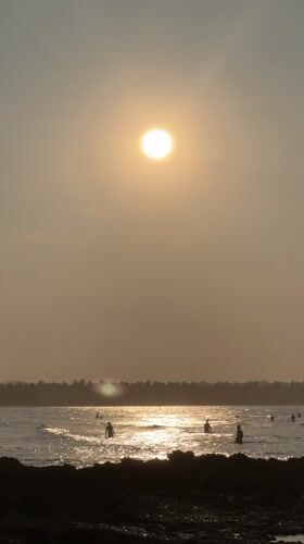 Morning beach activities documented in General Luna, Philippines