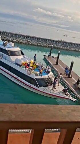 Evening ferry operations documented at Nusa Penida marina