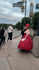 Period costumes and motorcycles near Saint Petersburg's historic landmarks