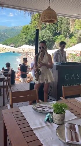 Saxophonist and DJ perform beachside lunch set in Budva
