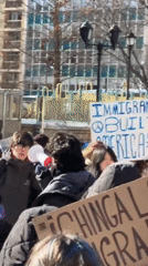 Pro-immigrant protesters rally against ICE in snowy New York
