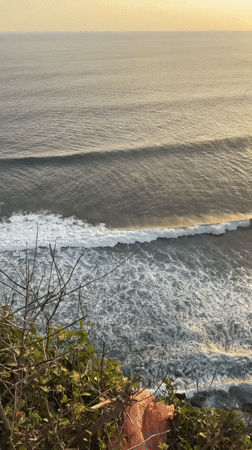 Clifftop lighthouse documented during sunset in Kuta Selatan