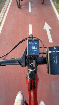 E-bike rider travels paved path in Vila Real, Portugal