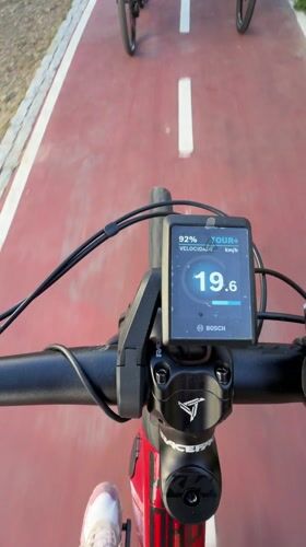 E-bike rider travels paved path in Vila Real, Portugal