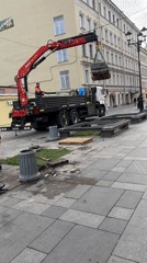 Street maintenance crews install stone blocks in central Saint Petersburg