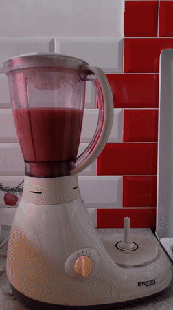 Early morning smoothie preparation captured in Hrodna kitchen
