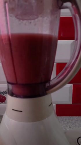 Early morning smoothie preparation captured in Hrodna kitchen
