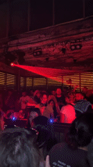DJ performs at red-lit London nightclub in early hours
