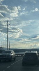 Driver captures scenic mountain view near T'bilisi waterway
