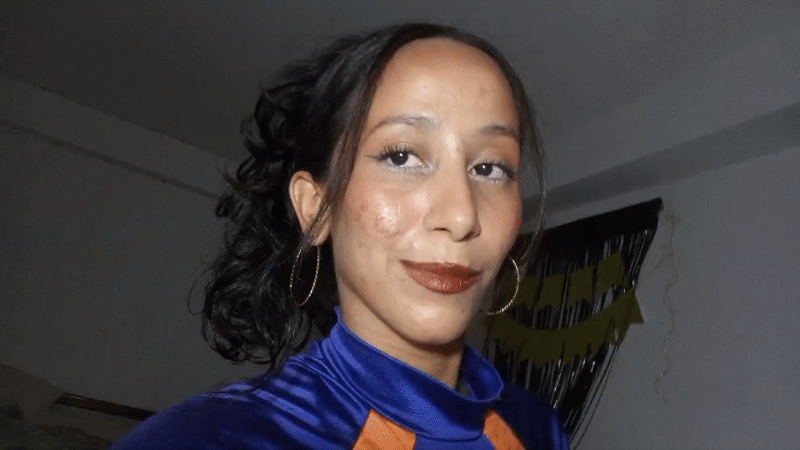 Woman poses for video in blue outfit in Porlamar