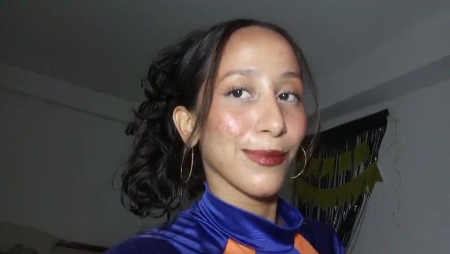 Woman poses for video in blue outfit in Porlamar