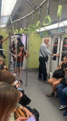 Woman with megaphone spotted on Buenos Aires subway