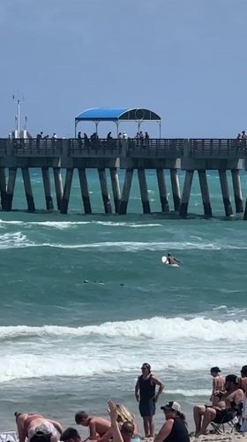 Evening beach activity documented at Lake Worth Beach pier