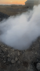 Smoking ground vent and fresh food in Ақши, Kazakhstan