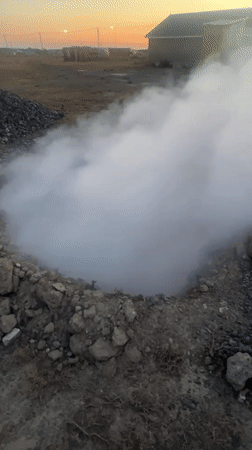 Smoking ground vent and fresh food in Ақши, Kazakhstan