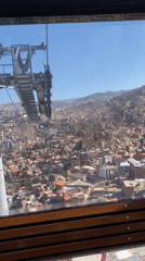 Cable car passenger films La Paz cityscape views