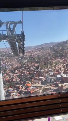 Cable car passenger films La Paz cityscape views