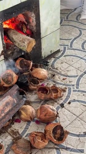 Traditional food preparation and river commerce documented in Vietnam