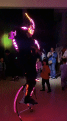 Robot performer on stilts entertains children's party in Argentina
