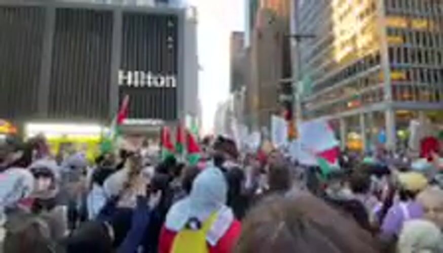 NYC protesters demonstrate against Mayor Mundani with Palestinian flags