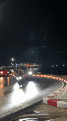 Nighttime scenes captured in Nathon, Thailand during rainy conditions
