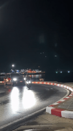 Nighttime scenes captured in Nathon, Thailand during rainy conditions