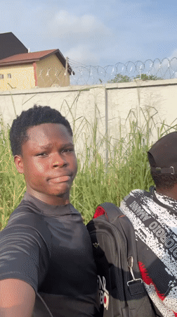 Young men recorded casual video outdoors in Ihiagwa Nigeria