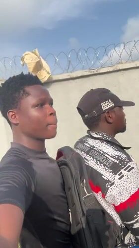 Young men recorded casual video outdoors in Ihiagwa Nigeria