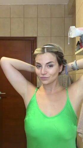 Bathroom mirror selfie session with a hair wrap in Budva