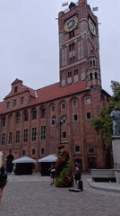 Toruń's Gothic Old Town square and castle on a summer evening