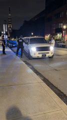 Montreal Police Conduct Nighttime Traffic Stop Involving White Limousine