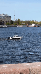 White motorboat spotted on Saint Petersburg river during sunny day