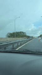 Wet highway conditions observed in Bandaragama during overcast weather