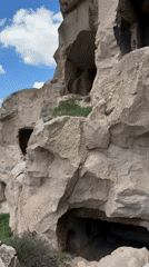 Tourist documents ancient cave dwellings and tunnels in Acıgöl
