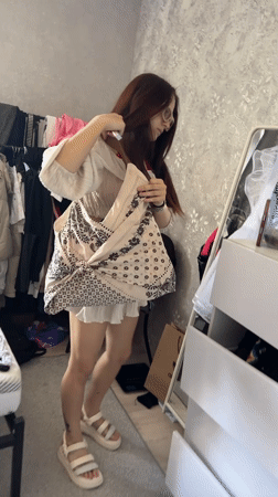 Morning scenes documented in Abakan: woman indoors, pottery statue