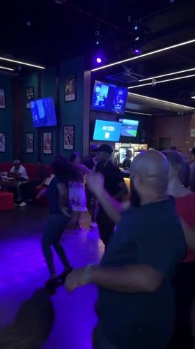Couples enjoy salsa dancing at Colombo bar evening