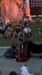 Crowd gathers to view ornate statues in Kediri, Indonesia