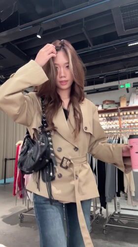 Women take selfies in clothing store in China