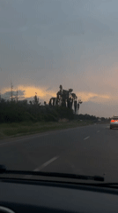 Vehicle journey documented through rural Morocco during sunset hours