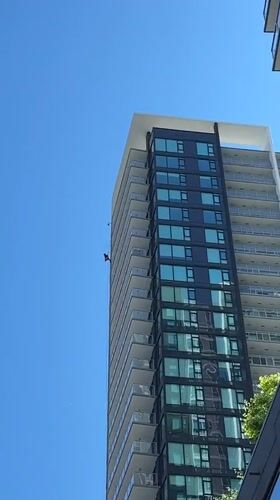 Worker rappels down Coquitlam high-rise during evening maintenance